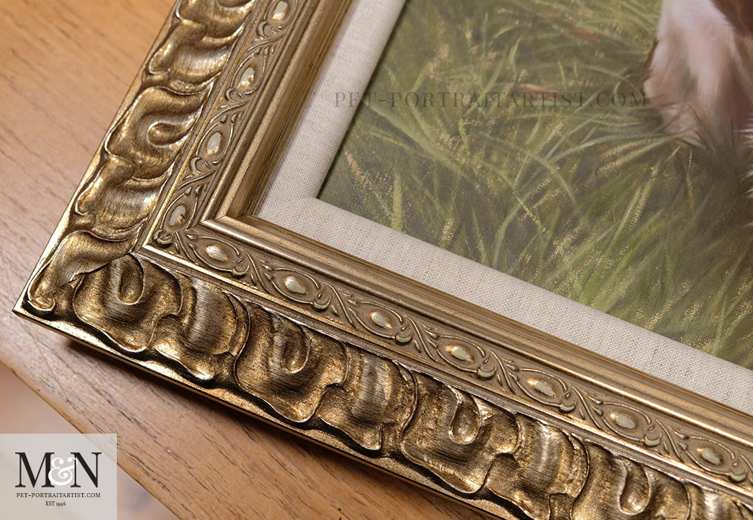 Close up of the ornate pewter frame showing the slip detail. 