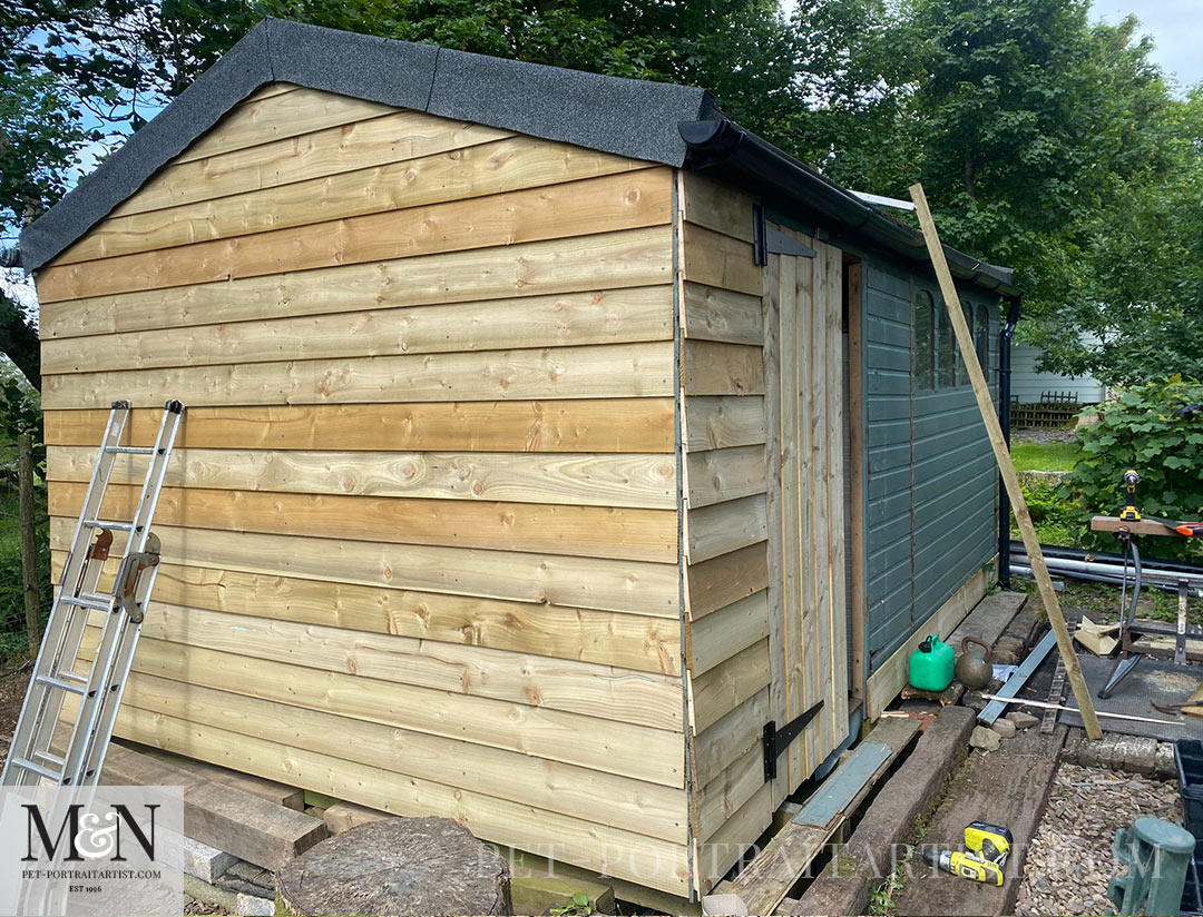 Cladding the old tool shed