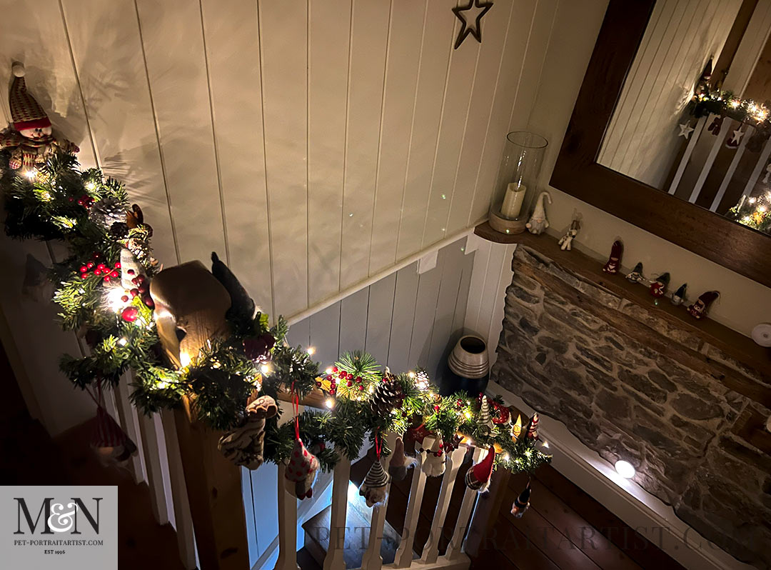 The stairway decorated for Christmas in the cottage