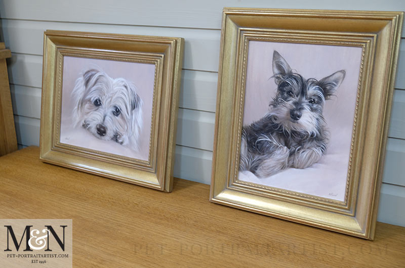 The portraits of Chucho and Jack Henry side by side