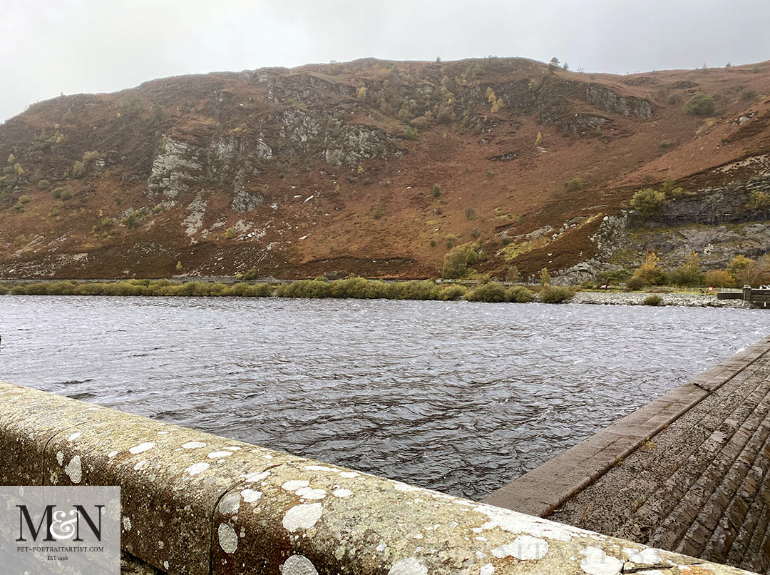 Water at the top of the dam