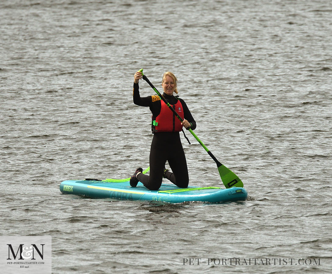 Melanie's August Monthly News - Melanie Paddle boarding