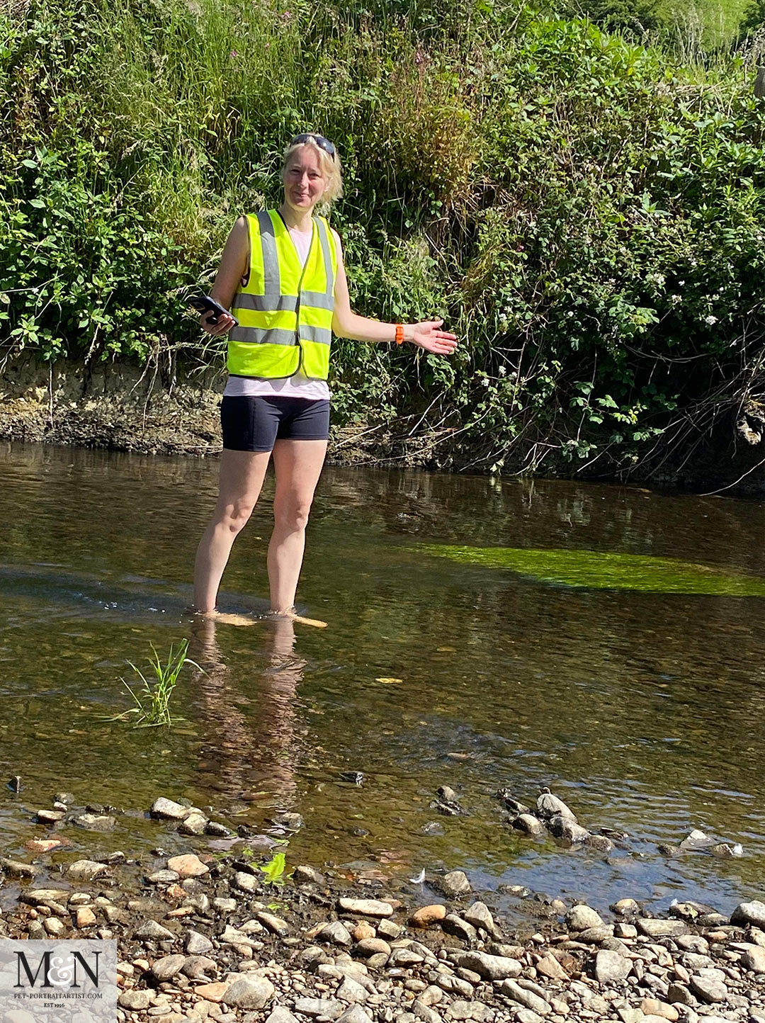 Melanie in the river paddling! 